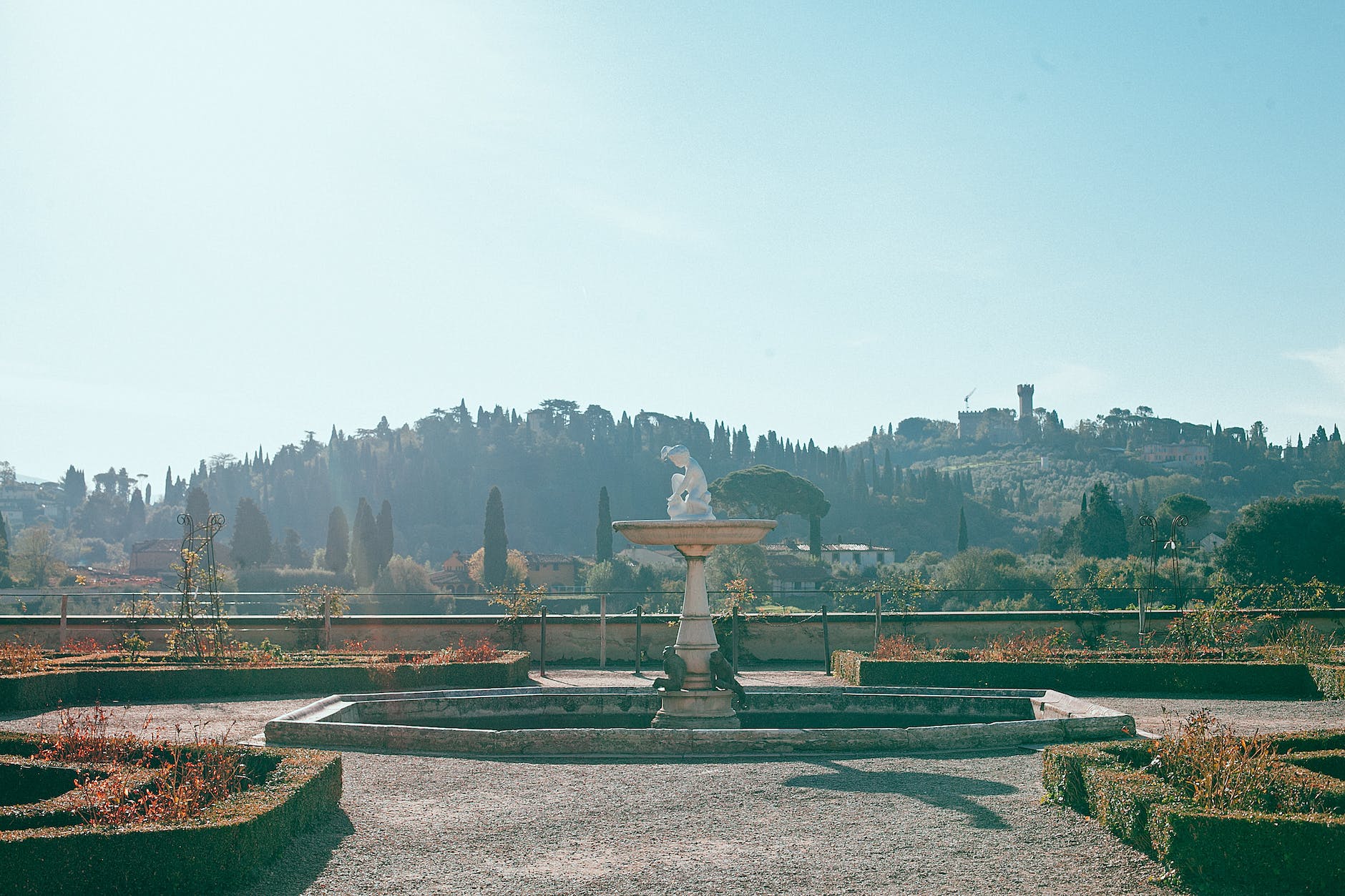 old stone fountain with sculpture