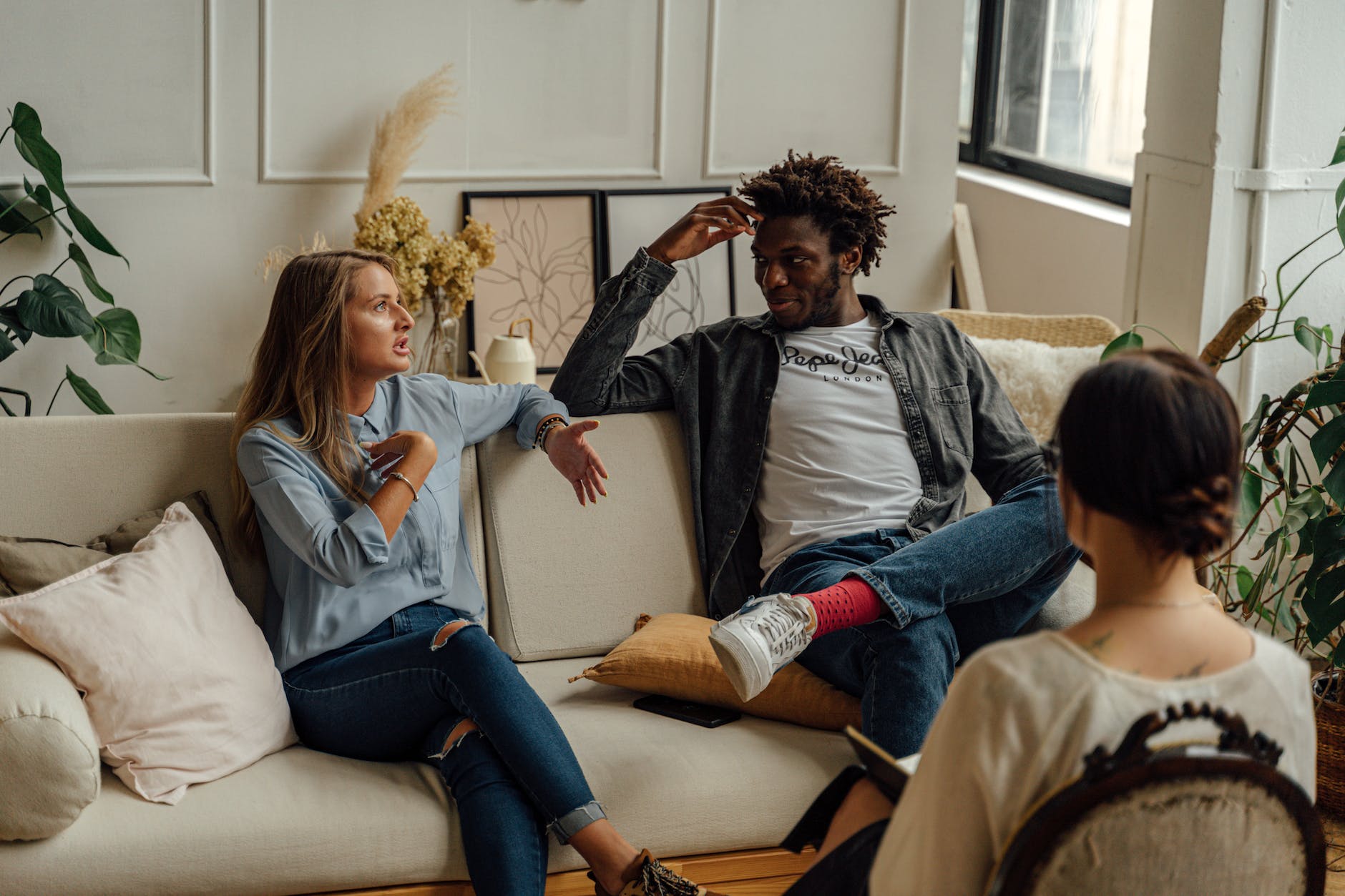 a woman talking at a couple s therapy session