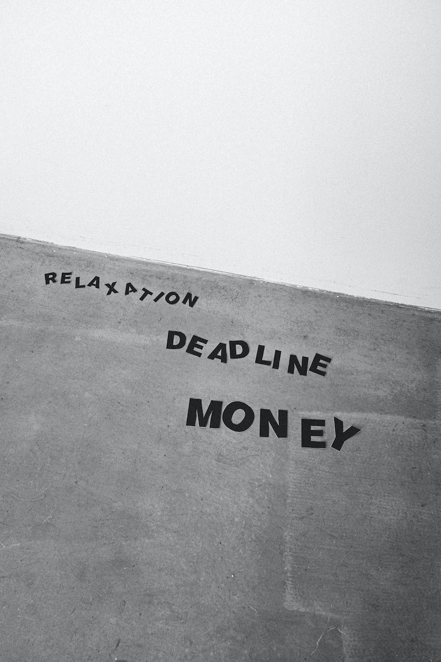 backdrop of deadline and money inscriptions on rough wall